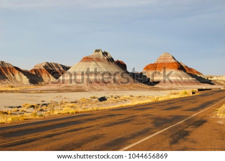 Layered sedimentary rocks in the Petrified Forest National Park, Arizona USA Royalty-Free Stock Photo #1044656869
