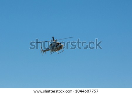 transport helicopter with load in the sky