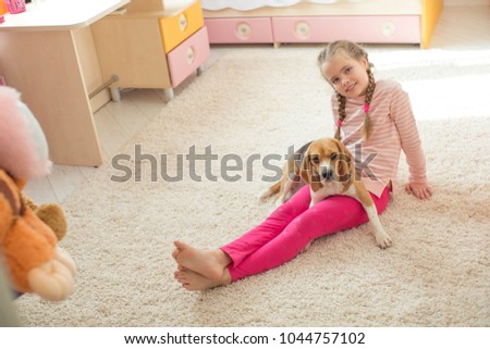 Children with a dog at home