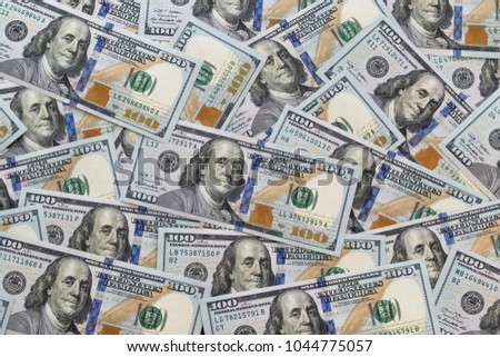 One hundred dollars, new 100 US dollar. One hundred dollars background. Concept finance, investments, deposits.