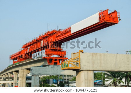 Giant construction crane for electric train in Bangkok Thailand.