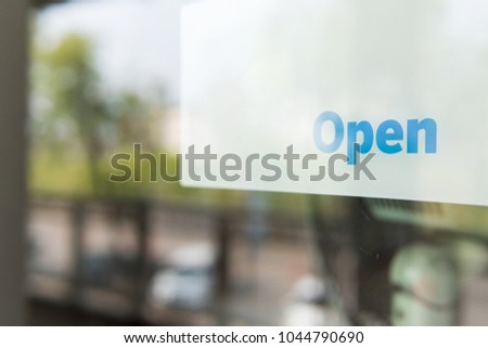 Open sign infront of door,Information message for cafe store resturant and other business,Door modern message display.