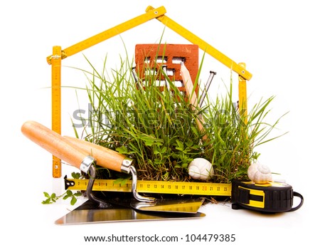  mason tools and green grass