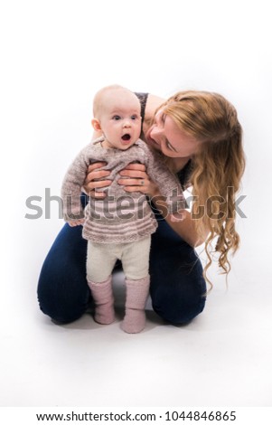 Young mother with her baby girl
