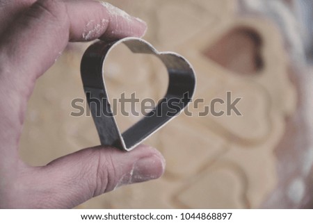 Homemade pastry. Heart shaped mold. Stock image.