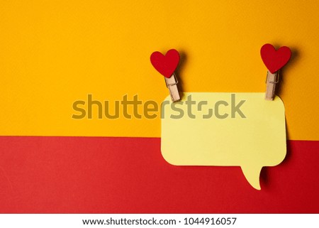 color background, silvered clothes with hearts, yellow note...                              