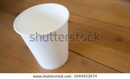 Paper cup with lipstick