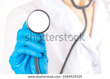 Hand doctor stethoscope medical tools phonendoscope doctor , concept of treating a doctor office.