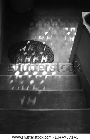 sunrays on stairs black and white