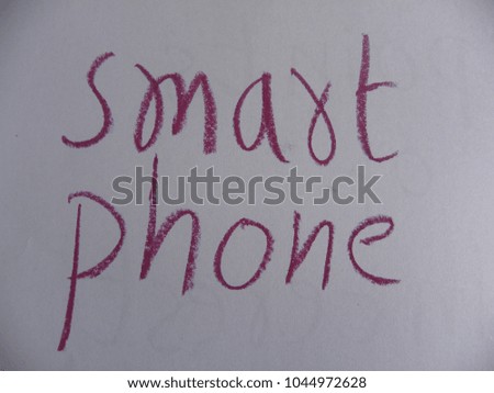 Text smart phone hand written by red oil pastel on white color paper