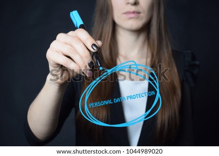 The businessman writes a blue marker inscription:PERSONAL DATA PROTECTION