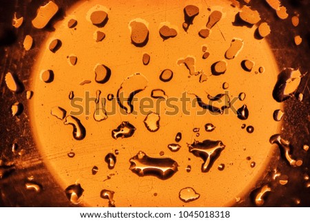 Abstract background of gold water drops light bokeh circles. Bright round defocused lights. Can use for poster, website, brochure, print.