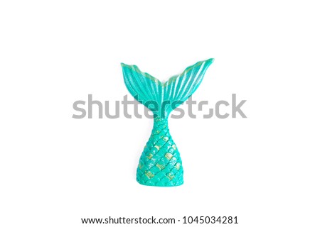 Mermaid's tail. A mermaid's tail or a fish tail made from sugar for cupcake decoration.
