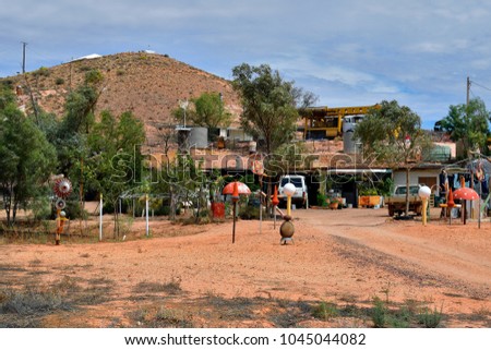 COOBER PEDY, SA, AUSTRALIA - NOVEMBER 14: Mining equipment and decoration at home built into rock in the opal village in South Australia, on November 14, 2017 in Coober Pedy, Australia