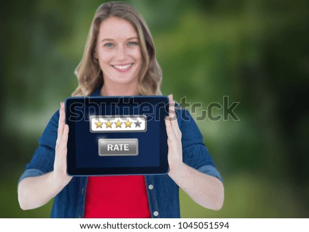 Digital composite of Woman holding tablet with star ratings button
