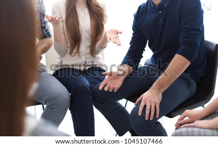People at group therapy session
