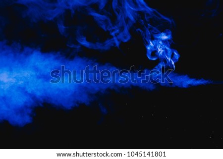 blue smoke abstract on black background, darkness concept
