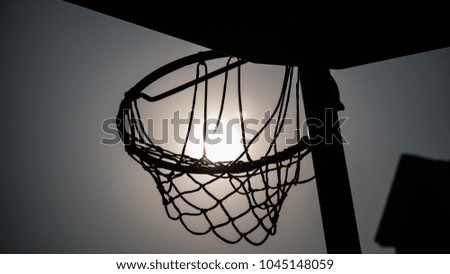 Basketball net under sunlight