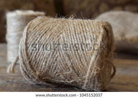 A close up image of a skein of jute thread.