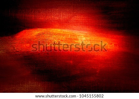 Fire and lava in darkness abstract art background. Oil painting on linen canvas. Black and red tones texture. Dimmed picture fragment. Brushstrokes of paint.