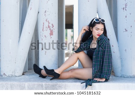 Portrait of beautiful asian woman,Hipsters girl for take a picture outdoor,Thailand people