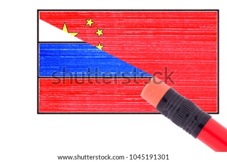 China and Russia. Two painted flags. The appearance of one flag from under the other when erased by an eraser.
