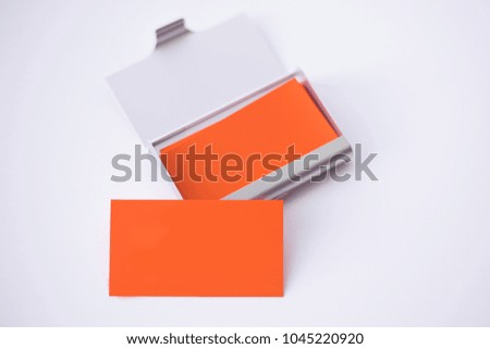 Orange paper business card mock up