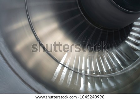 Blurred background with a turbojet engine fan image in motion Royalty-Free Stock Photo #1045240990