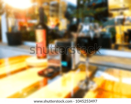Picture blurred for background abstract. Blur drink in restaurant