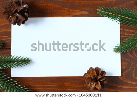 White paper on a wooden background