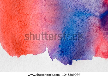 Abstract hand painted watercolor background, wallpaper, texture, red, blue and violet painting on canvas. Contemporary art