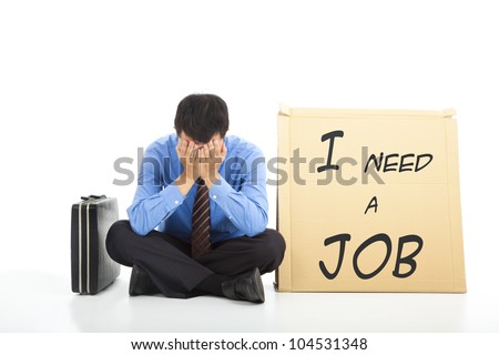 Depressed businessman looking for a job
