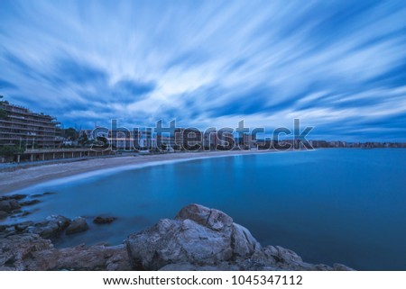 Long exposure evening picture in a beach in a Spanish village Sant antoni de Calonge in Costa Brava.