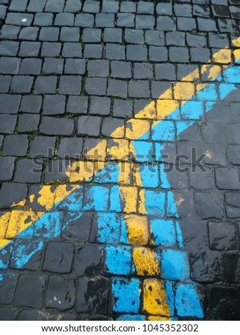 yellow and blue parking strips 