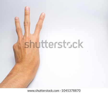 A man left hand Asian are three fingers.
