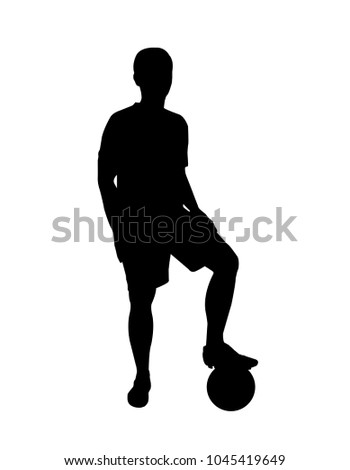 silhouette soccer player standing with ball