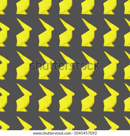 Seamless texture, paper Easter Bunny origami pattern, on colored background.