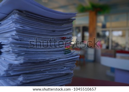 Paperwork on the table with blur background , business and education.