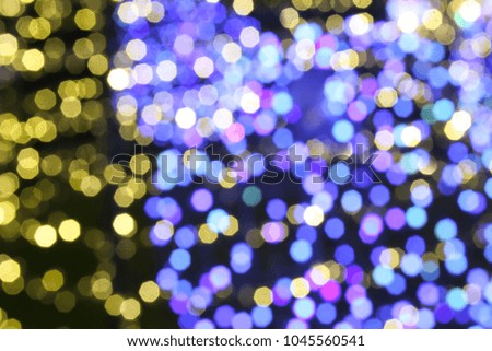 Abstract blurry illuminated background of Christmas decoration.
