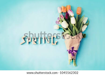Spring background with Tulips flowers in vintage color, top view