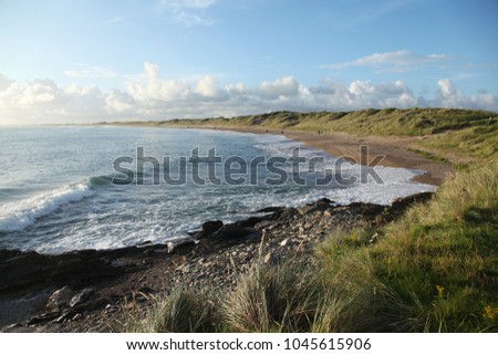 Waves on the beach in the evening in Kilmore Quay Royalty-Free Stock Photo #1045615906