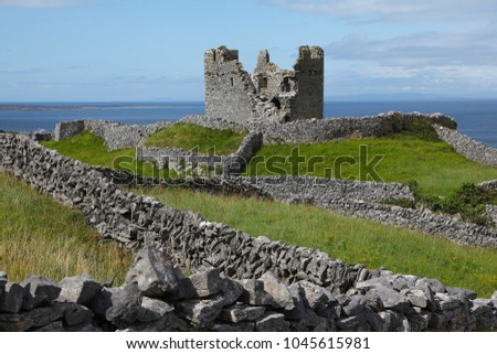 Tower and castle ruins on Inisheer island Royalty-Free Stock Photo #1045615981