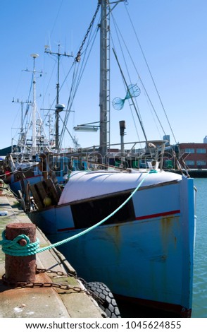 Laesoe / Denmark: Fishing boats at the pier in Oesterby Haven in summer