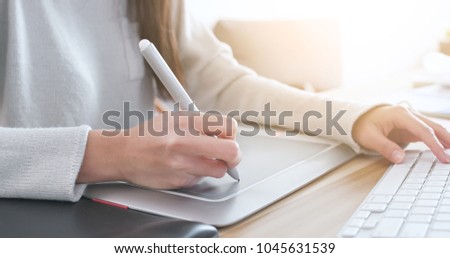 Woman working on laptop computer 