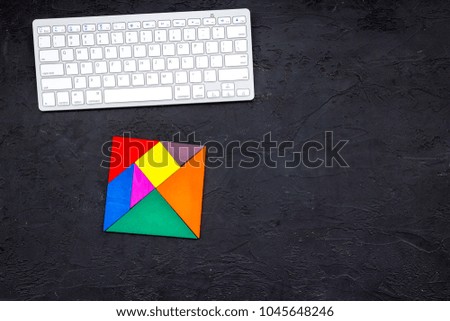 Business solutions, success and strategy. Puzzle with paper pieces office desk dark background top view mock-up