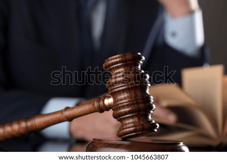 Law concept. Judge, gavel, balance. White collar, man in suit.