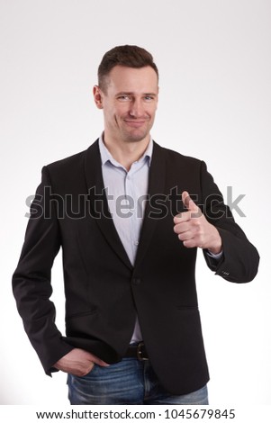 Young man show thumb up isolated on white background