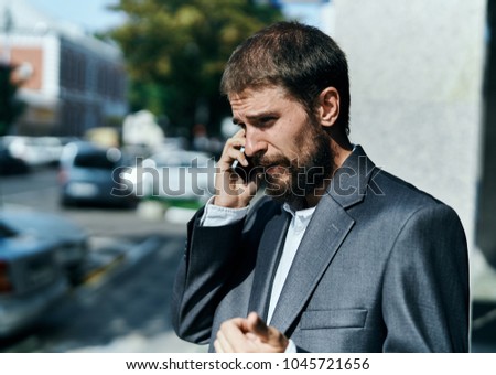 the man is talking on the phone                           