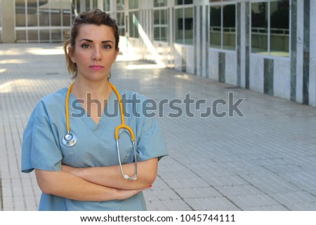 Healthcare professional with arms crossed 
