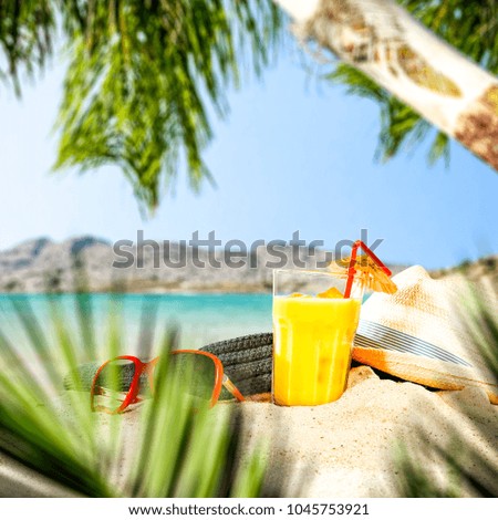 Sunrise drink on beach and summer time. 